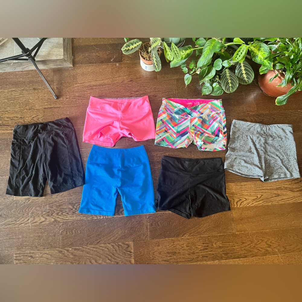 Under Armour and assorted running and bike shorts size small black grey pink
